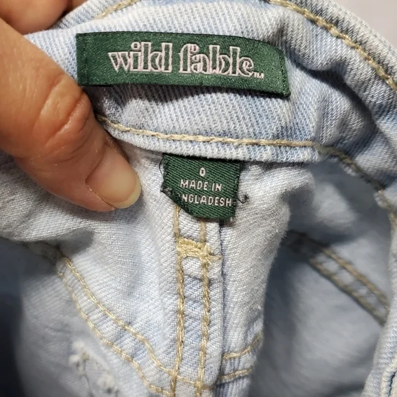 Highest-Rise Light Wash Button Fly Shorts - Picture 10 of 11